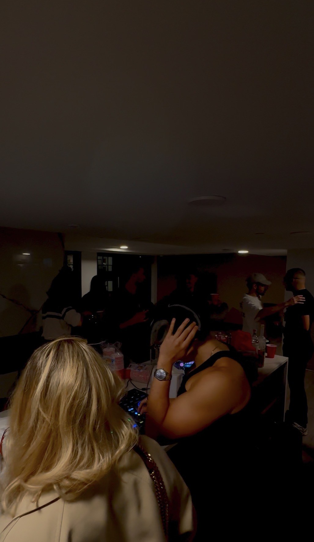 Guests dancing at an indoor celebration