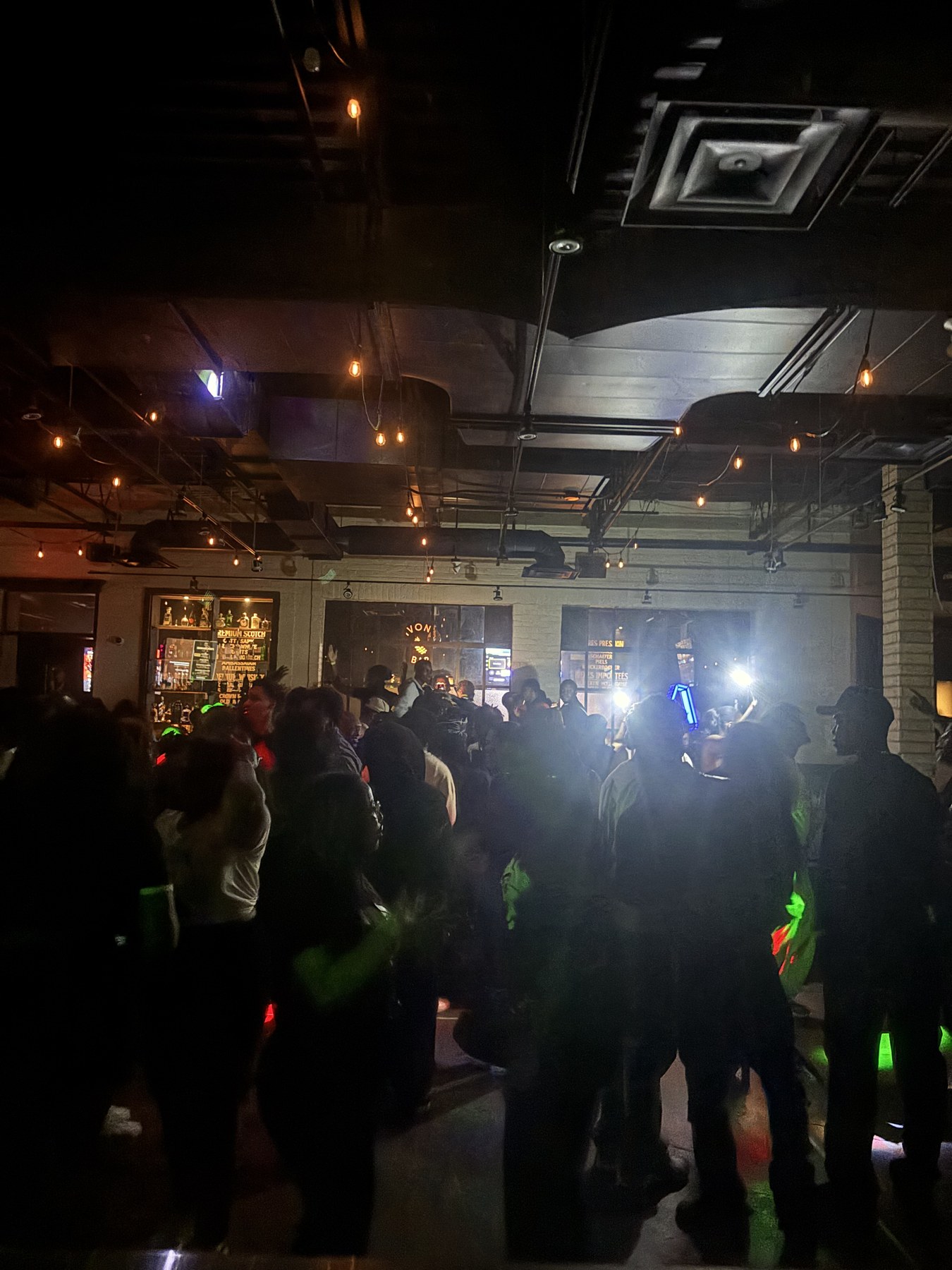 Guests gathered beneath the venue lights
