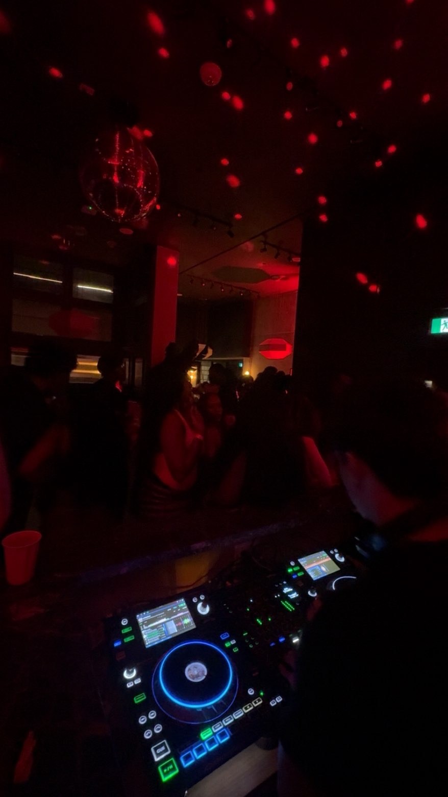 Close view of the decks under red lighting